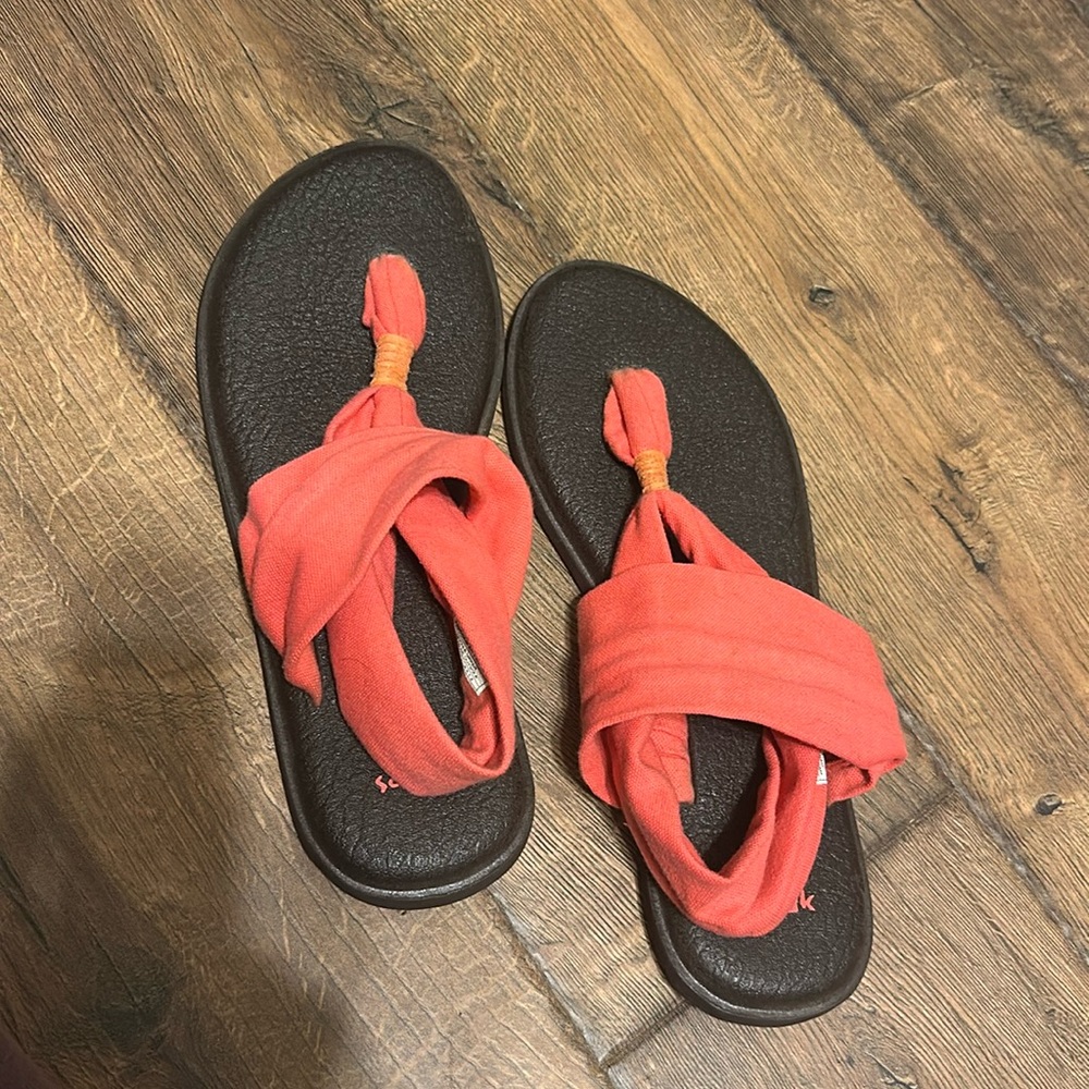 Pink Sanuk size 8